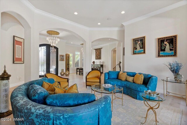 interior space with recessed lighting, crown molding, light wood-style flooring, and baseboards