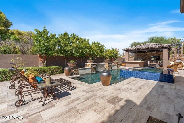 view of pool featuring a gazebo, a fenced backyard, a fenced in pool, and an in ground hot tub