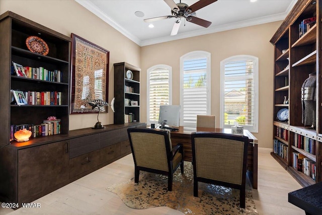 office space with light wood-style floors, ceiling fan, and ornamental molding