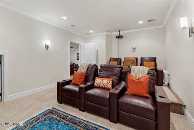 cinema room with light carpet, ornamental molding, recessed lighting, and baseboards