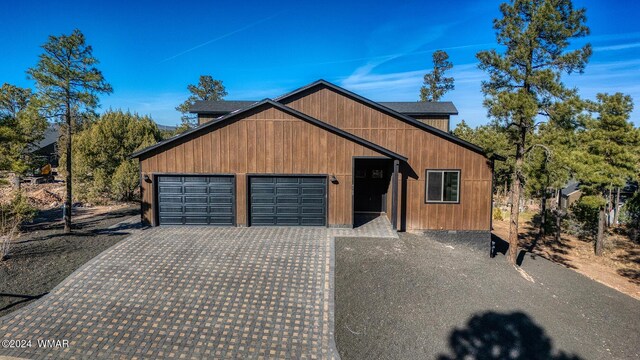 view of front of property with decorative driveway