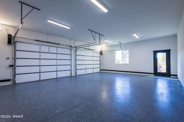 garage featuring baseboards