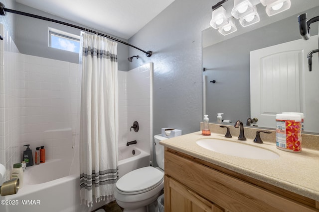 bathroom with shower / bath combination with curtain, vanity, and toilet