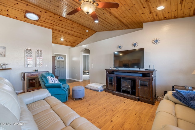 living area with arched walkways, lofted ceiling, recessed lighting, wood ceiling, and wood finished floors