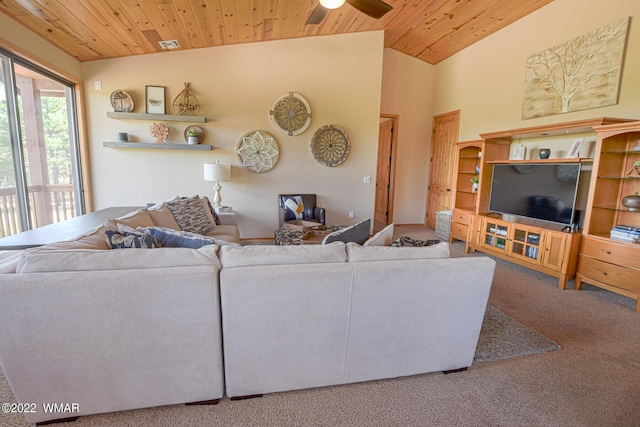 living room featuring lofted ceiling, wooden ceiling, ceiling fan, and carpet