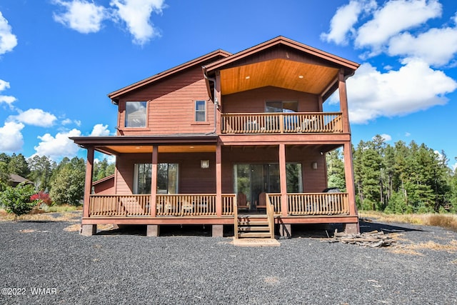 rear view of property with a deck