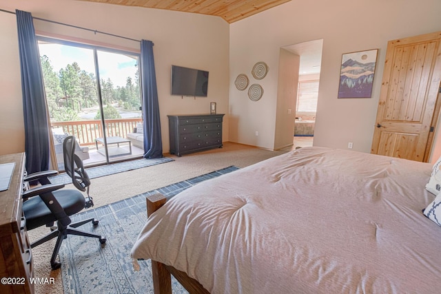 carpeted bedroom featuring access to exterior, wooden ceiling, vaulted ceiling, and ensuite bath