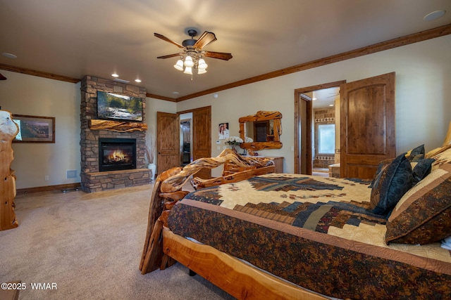 2320 Chandelle Ln, Overgaard, AZ 85933 - bedroom featuring carpet floors, ornamental molding, a stone fireplace, recessed lighting, and ensuite bath