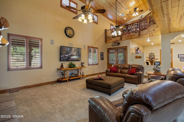 2320 Chandelle Ln, Overgaard, AZ 85933 - carpeted living area featuring wood ceiling, a ceiling fan, high vaulted ceiling, arched walkways, and recessed lighting