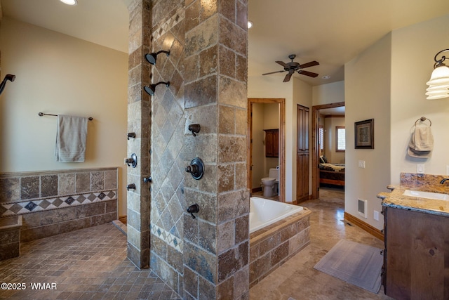 2320 Chandelle Ln, Overgaard, AZ 85933 - ensuite bathroom featuring vanity, a walk in shower, a ceiling fan, a bath, and recessed lighting