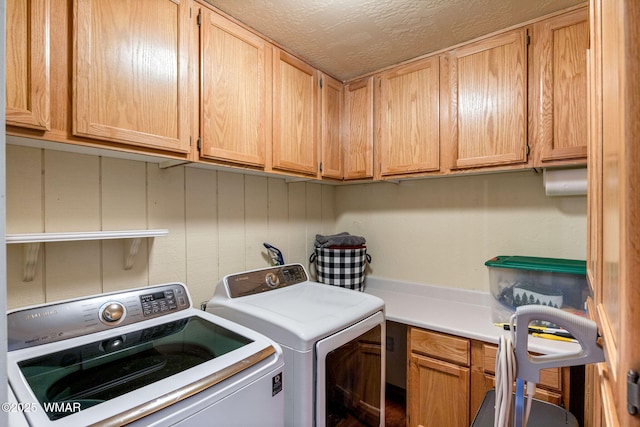 3060 Beaufeaux Ridge Rd, Overgaard, AZ 85933 - clothes washing area with washing machine and dryer and cabinet space