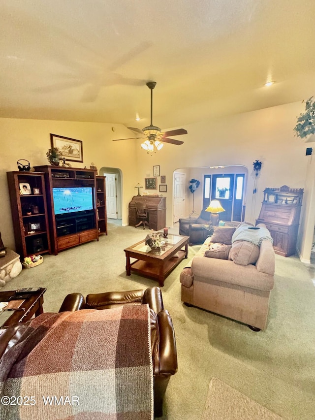 6843 Lucky Ln, Show Low, AZ 85901 - carpeted living room featuring arched walkways and a ceiling fan