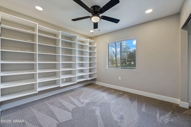 spare room featuring carpet flooring, recessed lighting, baseboards, and ceiling fan