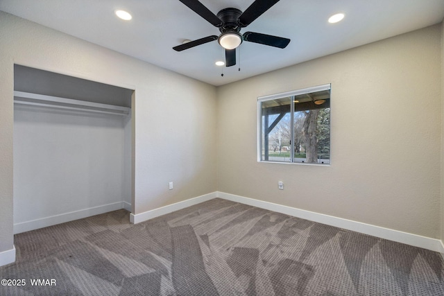 unfurnished bedroom featuring carpet flooring, recessed lighting, and baseboards