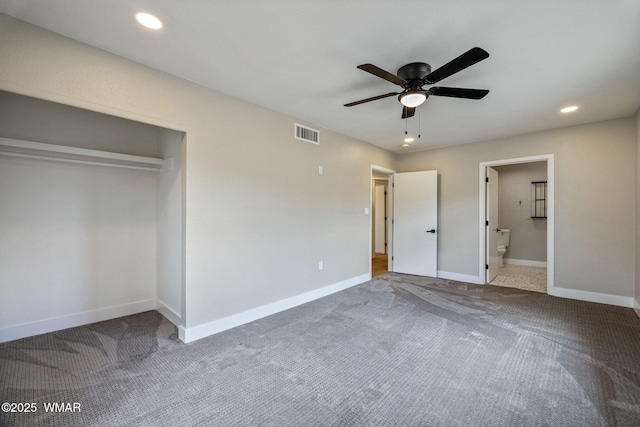 unfurnished bedroom with visible vents, carpet floors, baseboards, recessed lighting, and ensuite bath
