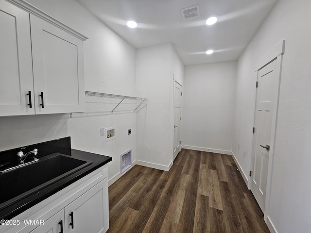 759 S 5th St W, Snowflake, AZ 85937 - washroom with hookup for an electric dryer, cabinet space, hookup for a washing machine, dark wood-type flooring, and baseboards