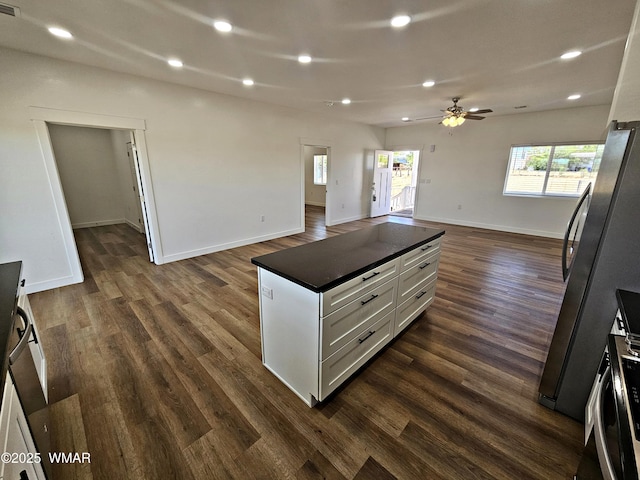 759 S 5th St W, Snowflake, AZ 85937 - kitchen with open floor plan, dark countertops, dark wood-type flooring, ceiling fan, and recessed lighting