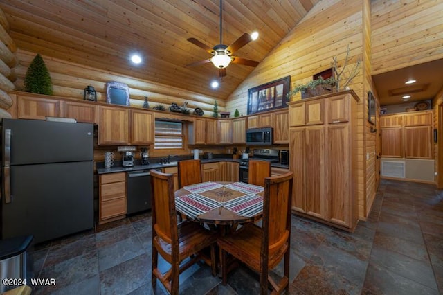 kitchen featuring stone tile floors, stainless steel appliances, dark countertops, wooden ceiling, and high vaulted ceiling