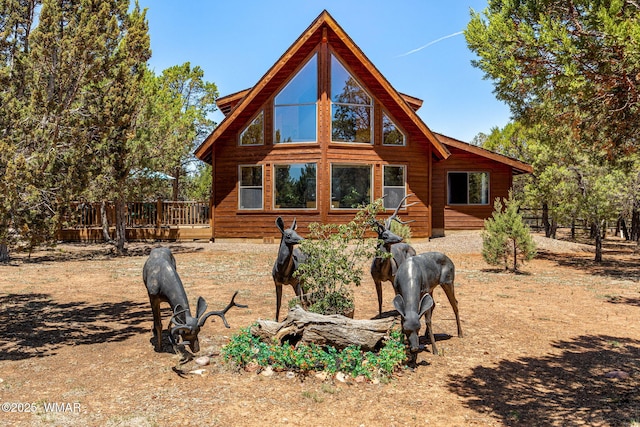 2796 Chandelle Ln, Overgaard, AZ 85933 - view of front of home with a wooden deck