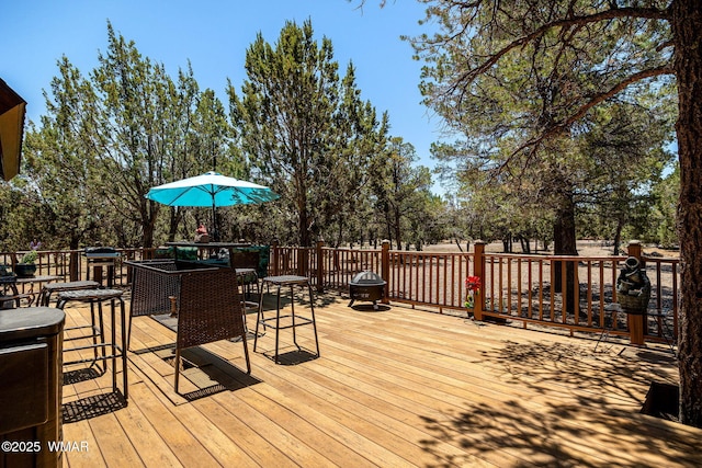 2796 Chandelle Ln, Overgaard, AZ 85933 - wooden deck with outdoor dining area