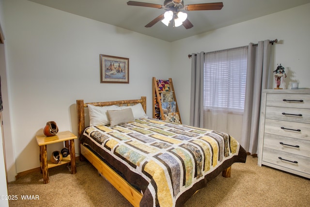 carpeted bedroom with a ceiling fan