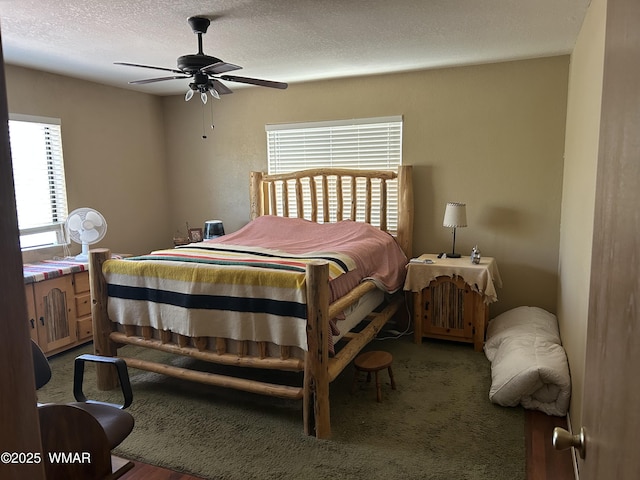 1890 Coyote Pl, Show Low, AZ 85901 - carpeted bedroom with a textured ceiling and ceiling fan