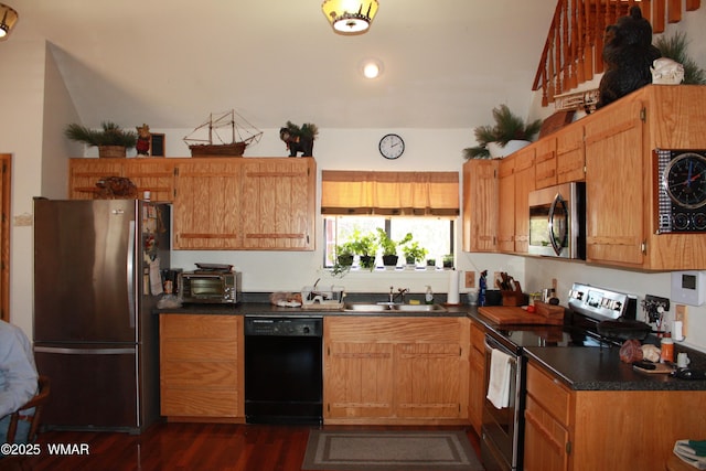 1890 Coyote Pl, Show Low, AZ 85901 - kitchen with appliances with stainless steel finishes, dark countertops, dark wood-style floors, and recessed lighting