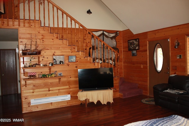 1890 Coyote Pl, Show Low, AZ 85901 - living area featuring wooden walls, wood finished floors, stairway, and high vaulted ceiling