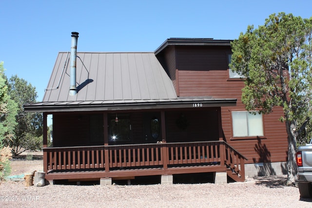 1890 Coyote Pl, Show Low, AZ 85901 - view of front of property featuring a standing seam roof, covered porch, and a metal roof