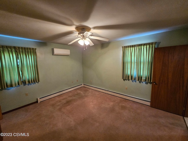 carpeted spare room with a baseboard radiator, ceiling fan, and a wall mounted air conditioner