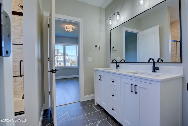 bathroom featuring vanity, independent shower and bath, and hardwood / wood-style flooring