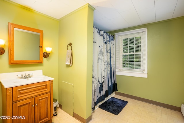 1243 Upper Mulberry St, Danville, PA 17821 - full bath featuring vanity, baseboards, toilet, curtained shower, and baseboard heating
