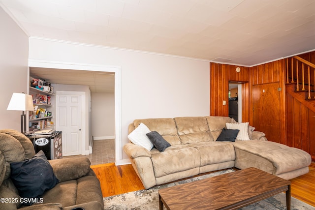 1243 Upper Mulberry St, Danville, PA 17821 - living area with wood finished floors, crown molding, and stairway