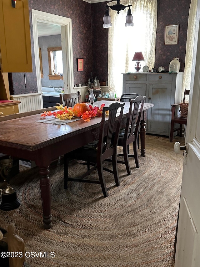 view of carpeted dining area