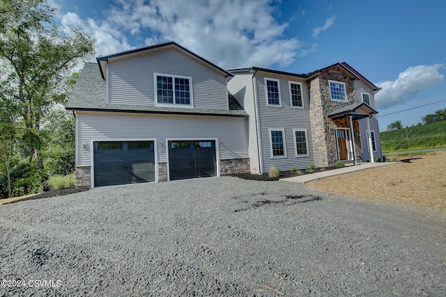 view of front of home featuring a garage