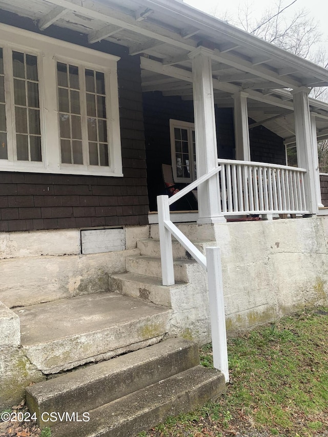 view of home's exterior with covered porch