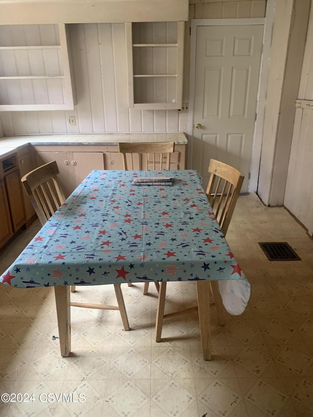 dining room with light tile floors