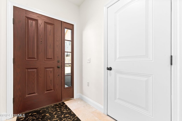 view of tiled foyer entrance