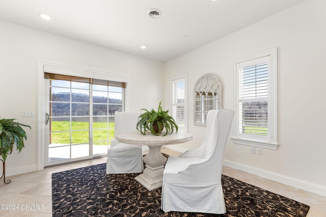 view of tiled dining space