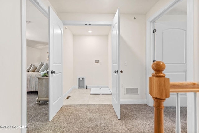 interior space with light colored carpet