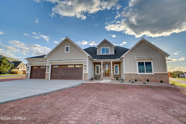 craftsman house featuring a garage