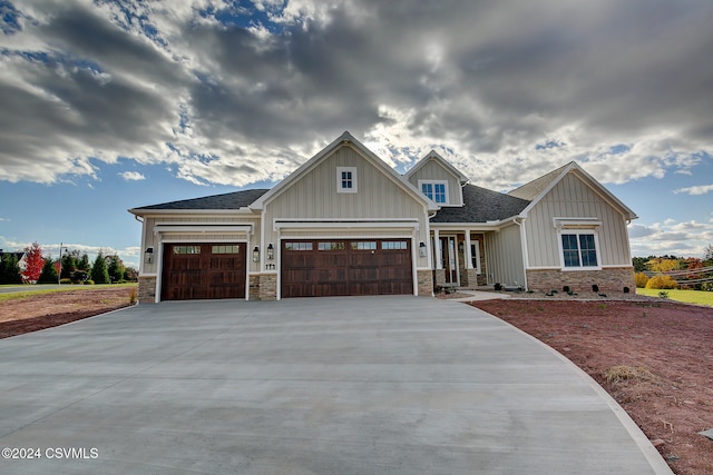 craftsman-style home with a garage