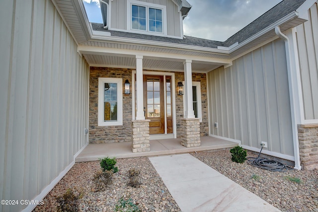 doorway to property featuring a porch