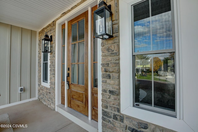 entrance to property with covered porch