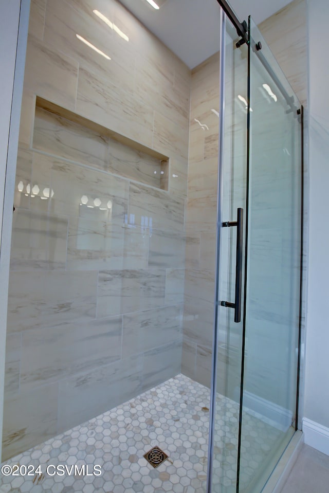 bathroom featuring walk in shower