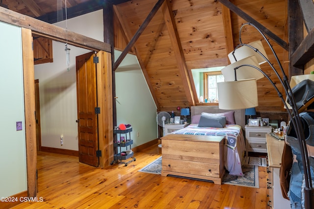 bedroom with wood ceiling, lofted ceiling with beams, and light wood-type flooring