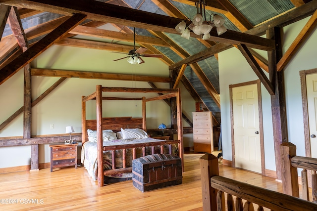 bedroom featuring beamed ceiling, ceiling fan with notable chandelier, light hardwood / wood-style floors, and high vaulted ceiling