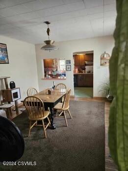 dining room featuring carpet flooring