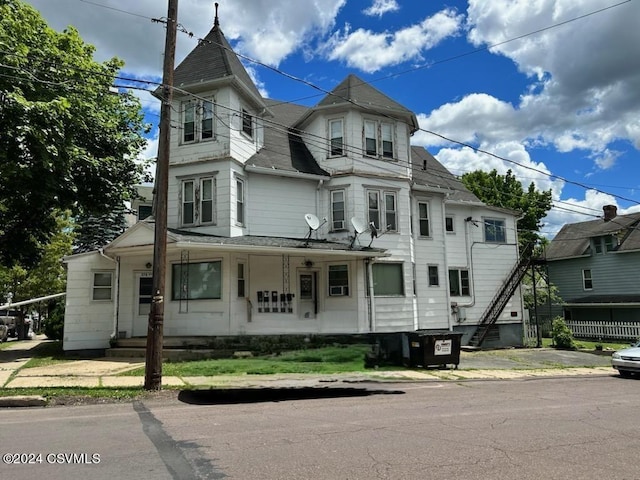 victorian home featuring a porch