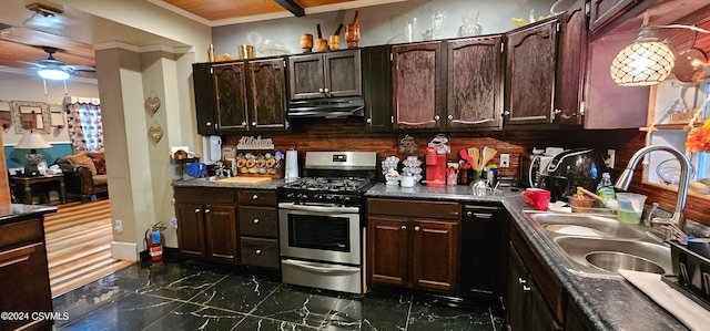 kitchen with sink, ceiling fan, dark brown cabinets, and gas range